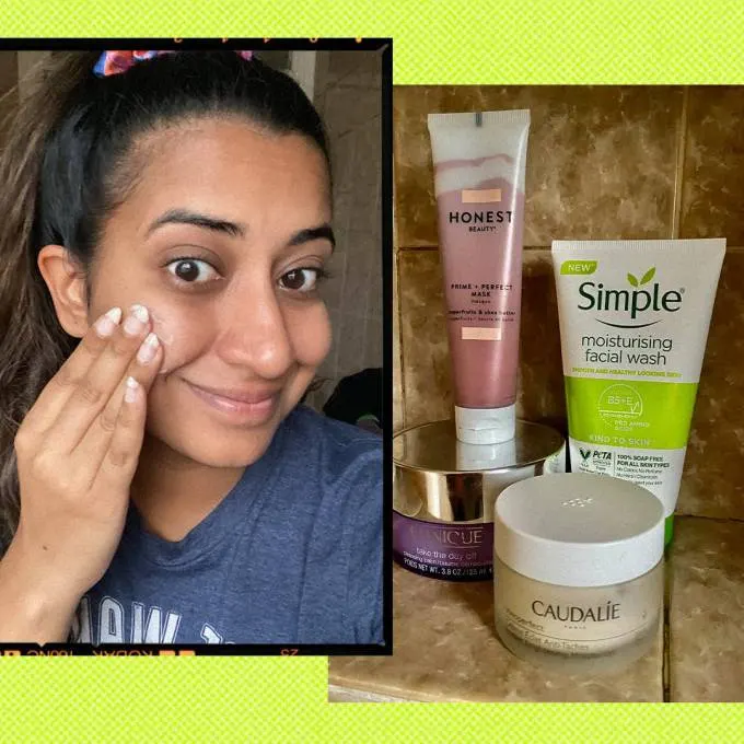 Hanna Ibrahim puts cream on her face and a selection of skincare products