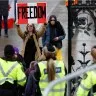 A protester yells at people leaving Parliament Hill as truckers and supporters continue to protest in Ottawa this week.