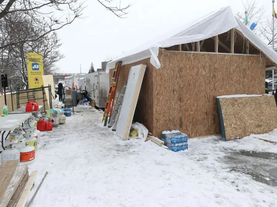 Anti-vaccine mandate protesters and truckers protesting their eighth day in Ottawa Friday. A building has been built on NCC property near the Rideau Canal.