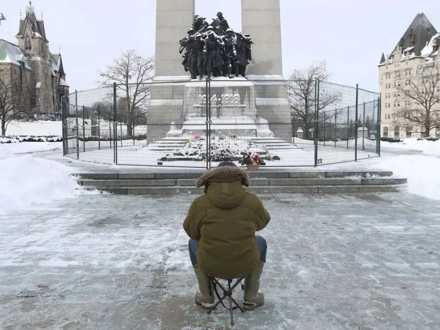 Anti-vaccine mandate protesters and truckers protesting their eighth day in Ottawa Friday.  A fence has been put up around the thumb of the unknown soldier.