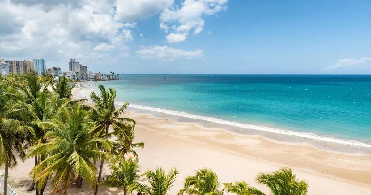 Beach travel Caribbean vacation landscape of Puerto Rico background.  Isla Verde in San Juan, Latin America island.  |