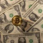 Bitcoin challenges Wall Street's inflation sell-off, adds gains as cryptocurrencies dip