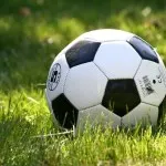 How are cryptocurrencies being used in sports like the AFL?