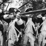 New England Revolution reloading their muskets