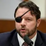GOP Rep. Dan Crenshaw of Texas questions witnesses during a House Homeland Security Committee hearing in September 2020.